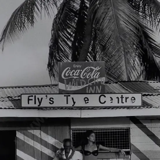 BISSELL, Christopher - Camera Press London - Relaxed Jamaicans alongside a model