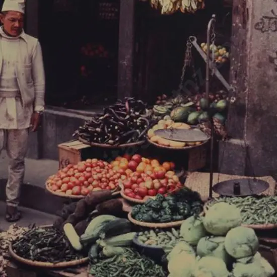 UNKNOWN photographer - Grocer in Kathmandu Vegetable Market, April '82