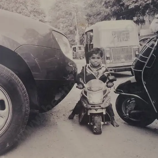 UNKNOWN photographer - Small Boy on Mini Motorbike (India)