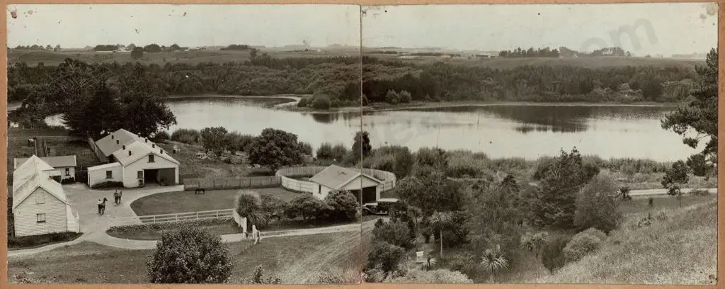UNKNOWN - New Zealand Homestead by Lake with Stables, 1920s Image 1++