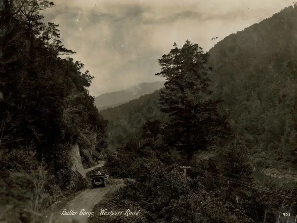 NZ GOVT PUBLICITY (Early 20th Cent.) - Buller Gorge, Westport Road with early Motorist, c. 1910 Image 1++